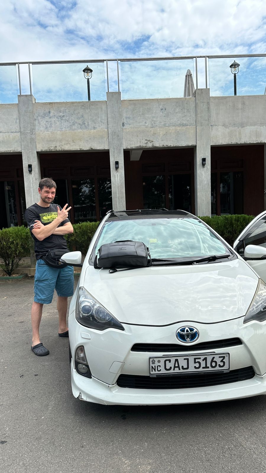 Happy customer with their rental car